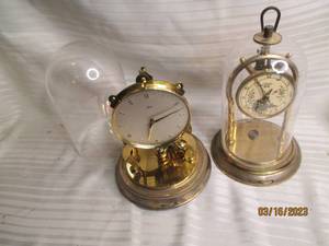 lot 232 image: (1) Schatz plastic covered brass cl...