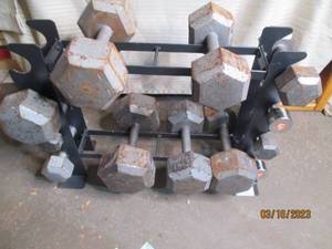 lot 246 image: Rack full of dumbells