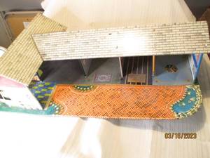 lot 275 image: Large metal doll house...