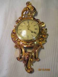 lot 280 image: Shiny gold tone decorative pendulum...