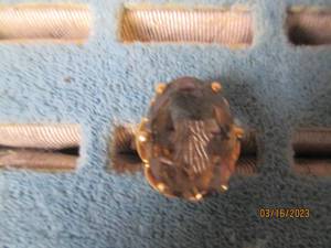 lot 296 image: genuine ladies topaz ring set in go...