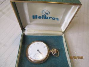lot 302 image: 1920 era Elgin pocket watch in gree...