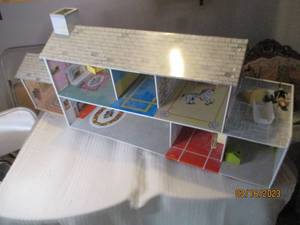 lot 310 image: Large metal doll house, assembled, ...