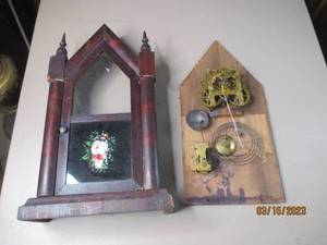 lot 122 image: Wooden Castle shaped pendulum mantl...