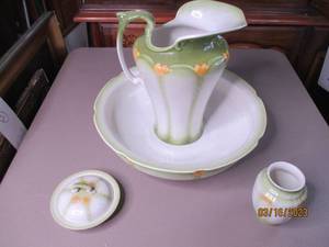 lot 133 image: Antique Green and Ivory Wash Basin,...