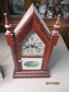 lot 159 image: Wooden Castle shaped pendulum mantl...