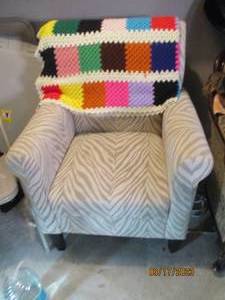 lot 161 image: Cream and Tan Zebra Striped sitting...
