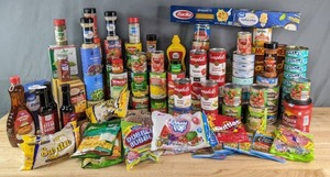 Assortment of Pantry Goods Pancake Syrup, Blow Pops, Skittles, Pinto Beans, Lays Stax, Del Monte Fruit Cocktail, Hormel Chili, Barilla Spaghetti, Campbells Cream of Mushroom, Folgers Classic Roast Coffee, ANCLA Tuna and More C