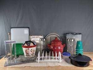 A Large Assortment of Kitchen Items Including Plastic Containers, Paper Towel Holder, Popcorn Popper and More   C