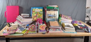 Assortment of Notebooks, Pens, Sharpies, and Art Supplies X