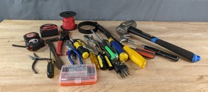 An Assortment of Tools Including Measuring Tapes, Pliers, Screwdrivers, Hammers and More  K
