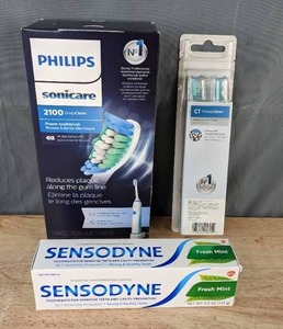 NEW Philips Sonicare Power Toothbrush, Sensodyne Fresh Mint Tooth Paste and Value Pack Philips Simply Clean Toothbrush Heads K