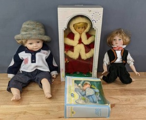 Four Collectible Dolls  Soft-berry Baby, Sweet Memories Porcelain Doll, Duck House Heirloom Doll, One Unknown Brand  K