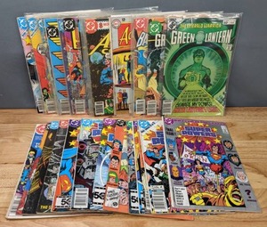 Collection of 31 Comic Books Super Powers, The New Teen Titans, Green Lantern, Batman and The Joker, Adventure Comics, Superman Starring in Action Comics, DC Wonder Woman, Etc. K