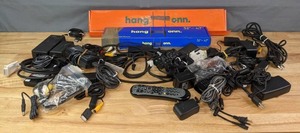 Miscellaneous Hang Onn TV Mount, Xfinity & Sony Remotes, Various Electrical and Power Cords, Digital Adapter and More K