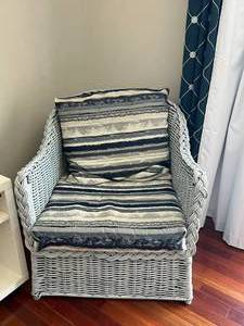 Two Rattan Chairs with Cushions