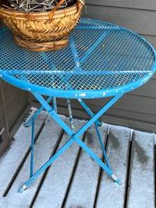 Blue Outdoor Folding Table with Basket and Decor