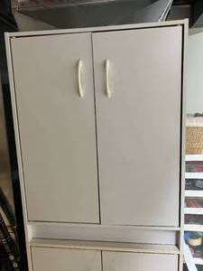 Two White Storage Cabinets