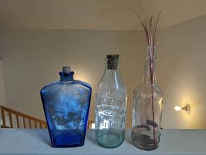 lot 23 image: Three Glass Bottles