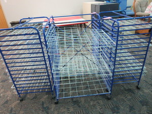 lot 120 image: ROLLING ART STORAGE RACKS