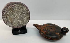 lot 22 image: Two Hand Made Copies 1 Phaistos Disc 7 34 T  1 Oil Lamp 8 12