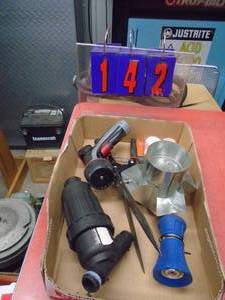 Flat of misc. garden hose nozzles & etc. As shown.