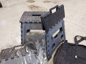 Stools, coolers, bags, and pens