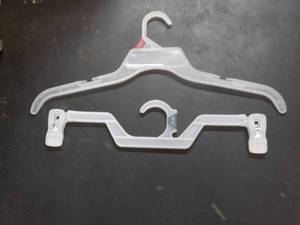 Large box of plastic hangers