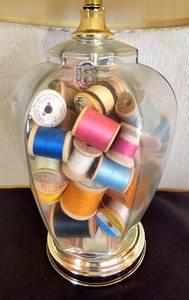 lot 205 image: Adorable Thread-Filled Glass Lamp