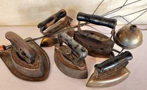 lot 208 image: Collectible Vintage Irons Plus Rug Beater