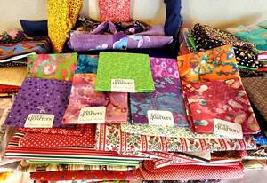 lot 219 image: Large Lot of Fun Fabric Remnants and Quilting Squares