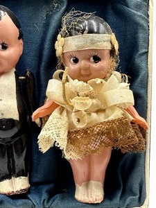 lot 59 image: Vintage Celluloid Bride and Groom Doll Set