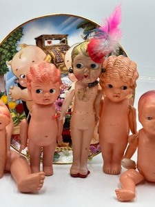 lot 60 image: Variety of Vintage Celluloid Cupid Dolls
