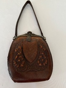 lot 71 image: Antique Leather Embossed Handbag