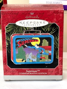 lot 81 image: Four Hallmark Keepsake Lunch Box Ornaments including Hallmark Keepsake Superman Lunchbox Ornament