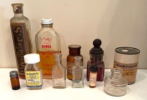 lot 260 image: Vintage Metal Cabinet with Variety of Vintage Potions