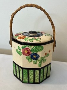 lot 141 image: Vintage Biscuit Jar with Rattan Handle and Pepper Shaker