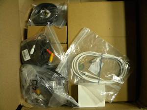 lot 19 image: New REVO America Ultra Hybrid 1TB DVR Surveillance System with 4 Full HD IndoorOutdoor Bullet Cameras