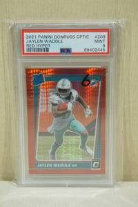 lot 55 image: 2021 Panini Donruss Optic Jaylen Waddle #208 Rookie Red Hyper Football Card - PSA 9
