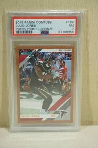 lot 64 image: 2019 Panini Donruss Julio Jones #19V Press Proof Bronze Football Card - PSA 7