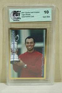 lot 103 image: 2001 Sports Card Investor Tiger Woods Gold Rookie Card - PGI 10