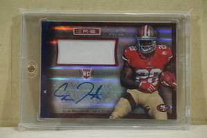 lot 181 image: 2014 Panini Rookies and Stars Carlos Hyde #RM-CH Signed Rookie Jersey Football Card - 925