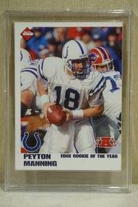 lot 206 image: 1999 Collectors Edge Peyton Manning #R1 ROY Football Card