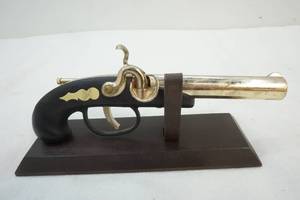 lot 81 image: black powder pistol replica