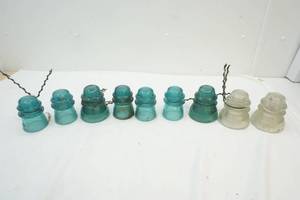 lot 84 image: vintage glass telephone insulators