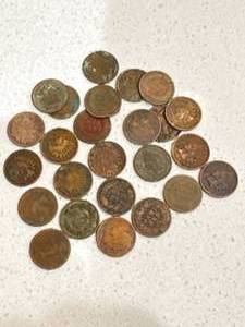 Lot of 25 Indian Head Pennies (rough)