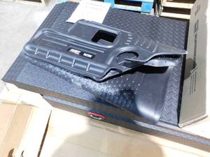 lot 104 image: Husky Liners 2nd Seat Floor Liner Fits 08-18 Town and CountryGrd Caravan Stowngo