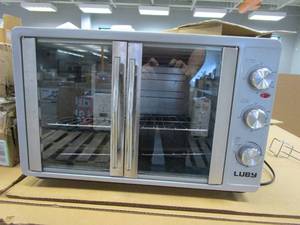 lot 320 image: LUBY Large Toaster Oven Countertop, French Door Designed, 55L, 18 Slices, 14 pizza, 20lb Turkey, Silver (FOT PARTS OR RESTORE, USED, MISSING PARTS)