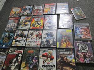 lot 122 image: lot of playstation 2 games , a play...
