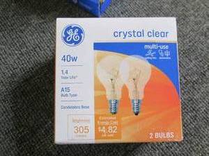 lot 472 image: lot of 62 packs of 40 watt crystal...